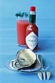 Fresh oysters and tomato gazpacho with tabasco