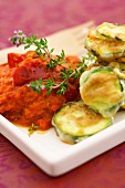 Courgette fritters with tomato and pepper coulis