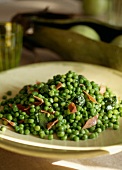 Dish of peas with diced bacon