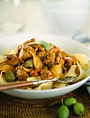 Lamb stew with mousseron mushrooms, green olives and tagliatelle