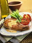 Veal chop with cheese sauce