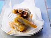 Brick pastries with chicken liver, figs and raisins