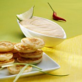 Blinis and taramosalata (a dip made from fish roe, Greece)