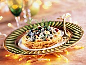 Puff pastry with snails and hazelnuts