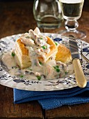 Chicken and mushroom puff pastry pie with peas