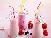 Various milkshakes with forest fruits