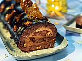 Nougat chocolate log cake with macadamia nuts