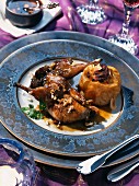 Glazed partridge with nougat served with baked apples with almonds