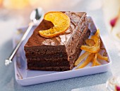 Opéra slice with chocolate and candid oranges