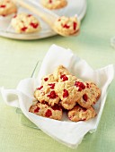 Biscuits dacquoise (egg white and almond biscuits) with coconut and chopped raspberries