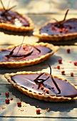 Chocolate and pink peppercorn shortbread tartlets