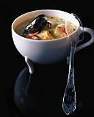 Seafood soup with coconut milk and chilli