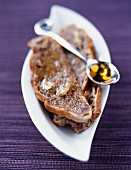Sliced Poilane walnut bread with maple syrup