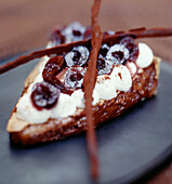 Cocoa and sour griotte cherry triangle dessert