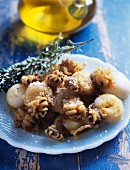Squid and calamary sauté with olive oil and rosemary