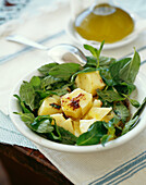 Potato salad with olive oil,fresh mint and spicies