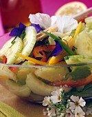 Cucumber and edible flower salad