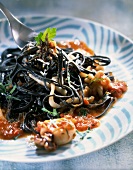 Squid ink Taglionis with calamary sauce