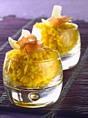 Saffron risotto with parmesan flakes and bacon