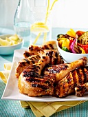 Pieces of chicken grilled on the berbecue