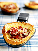 Raclette cheese and grisons meat tart