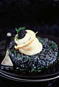 Sole fillet with Sevruga caviar and squid ink risotto