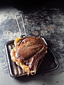 Beef chop cooked in a grill-pan