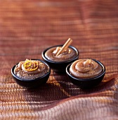 Praline -orange flavored chestnut cream,rum-cinnamon chestnut cream and gingerbread flavored chestnut cream