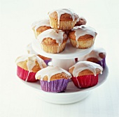 Presentation dish with muffins coated with icing