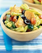 Pasta,salmon and vegetables with pesto sauce
