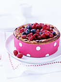 Cheesecake with raspberries and blueberries
