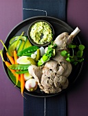 Stringed leg of lamb with green sauce