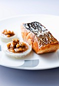Thick piece of roast bass with walnut toffee