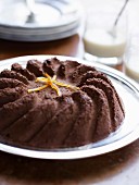 Rich chocolate cake with crystallized orange zests