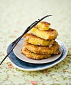 Sliced pineapple coated with vanilla-flavored breadcrumbs