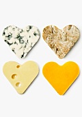 Vier Herzen aus verschiedenem Käse
