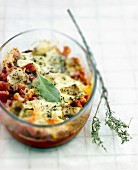 Eggplant and diced bacon cheese-topped dish