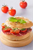 Pancetta, tomato and mozarella bagel sandwich