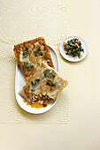 Egg,caper and parsley filo pastry pies