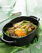 Casserole dish of eggs with leeks and mushrooms