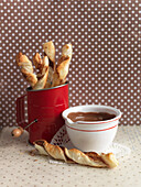 Flaky pastry twists and chocolate cream