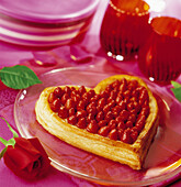 Heart-shaped strawberry flaky pastry tart