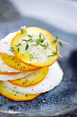 Yellow zucchini and goat's cheese Mille-feuille with poppy seeds