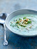 Cucumber and coriander soup with flaked crab meat