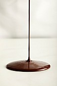 Pouring chocolate onto a flat surface