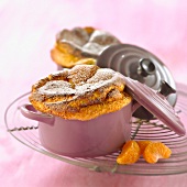 Clementine soufflé cooked in a small casserole dish