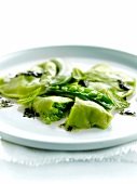 Green raviolis with tapenade