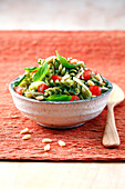 Green pasta and vegetable salad