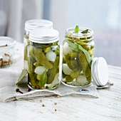 Jars of homemade pickled gherkins