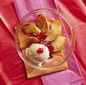 Roast apples with redcurrant jelly and vanilla ice cream